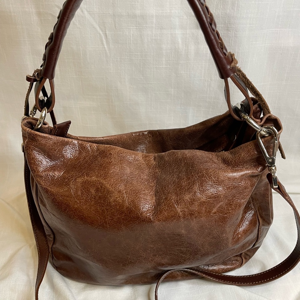Tano brown leather bag with purple inside